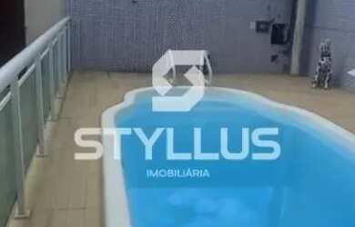 Imagem: A casa possui 3 Dormitórios, 5 Banheiros, 2 Vagas na garagem