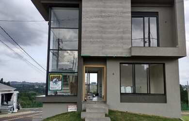 Imagem: A casa em condomínio possui 3 Dormitórios, 3 Banheiros, 2