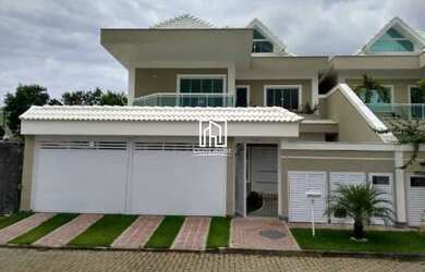 Imagem: A casa em condomínio possui 5 Dormitórios, 5 Banheiros, 2