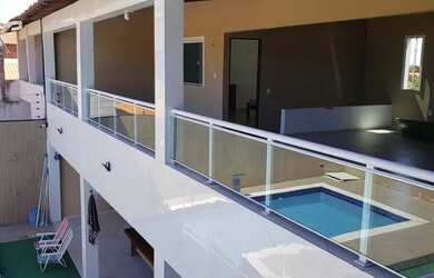 Imagem: A casa possui 4 Dormitórios, 3 Vagas na garagem e está localizado