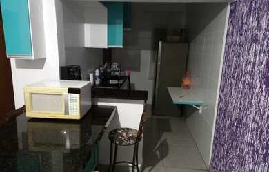 Imagem: A casa possui 2 Dormitórios e 2 Vagas na garagem e está localizado