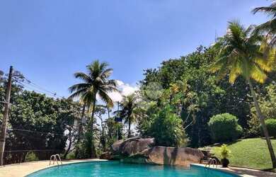 Imagem: A casa em condomínio possui 4 Dormitórios, 3 Banheiros, 2