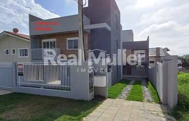 Imagem: A casa possui 3 Dormitórios, 3 Banheiros, 1 Vaga na garagem