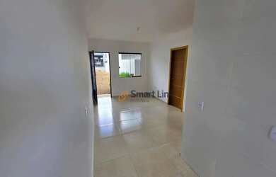 Imagem: A casa possui 2 Dormitórios, 1 Banheiro, 2 Vagas na garagem