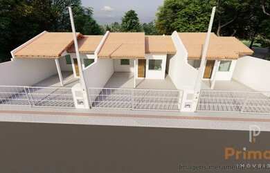 Imagem: A casa possui 3 Dormitórios, 1 Banheiro, 1 Vaga na garagem