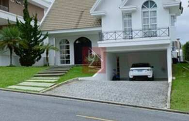 Imagem: A casa em condomínio possui 4 Dormitórios, 5 Banheiros, 4