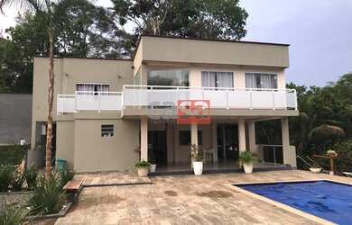 Imagem: A casa possui 3 Dormitórios, 4 Banheiros, 4 Vagas na garagem