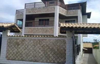 Imagem: A casa possui 5 Dormitórios, 5 Banheiros, 5 Vagas na garagem