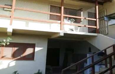 Imagem: A casa possui 4 Dormitórios, 3 Banheiros, 217m² de Área e