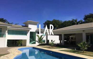 Imagem: A casa em condomínio possui 4 Dormitórios, 5 Banheiros, 5