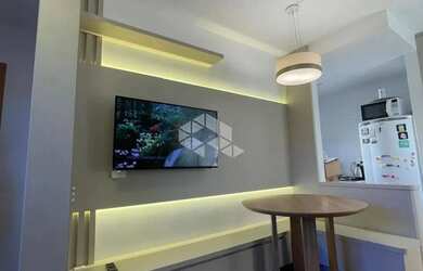 Imagem: O apartamento possui 2 Dormitórios, 1 Banheiro, 1 Vaga na garagem