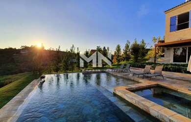 Imagem: A casa em condomínio possui 5 Dormitórios, 5 Banheiros, 5