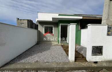 Imagem: A casa possui 2 Dormitórios, 2 Banheiros, 1 Vaga na garagem