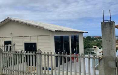 Imagem: A casa possui 5 Dormitórios, 4 Banheiros, 2 Vagas na garagem