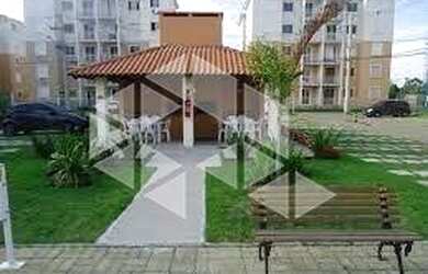 Imagem: O apartamento possui 2 Dormitórios, 1 Banheiro, 1 Vaga na garagem