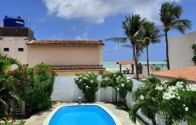 Imagem: A casa possui 4 Dormitórios, 5 Vagas na garagem e está localizado