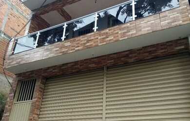 Imagem: A casa possui 4 Dormitórios, 4 Banheiros, 2 Vagas na garagem