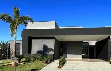 Imagem: A casa possui 5 Dormitórios, 4 Banheiros, 4 Vagas na garagem