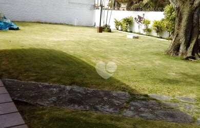 Imagem: A casa possui 5 Dormitórios, 5 Banheiros, 5 Vagas na garagem