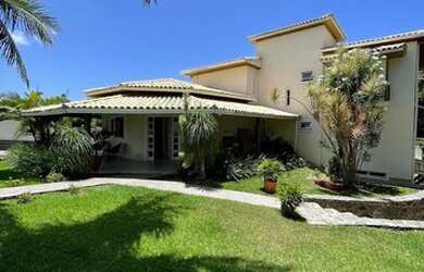 Imagem: A casa possui 4 Dormitórios, 4 Banheiros, 3 Vagas na garagem