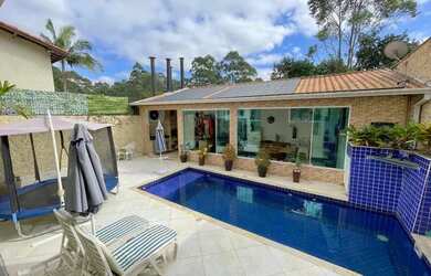 Imagem: A casa em condomínio possui 3 Dormitórios, 3 Banheiros, 5