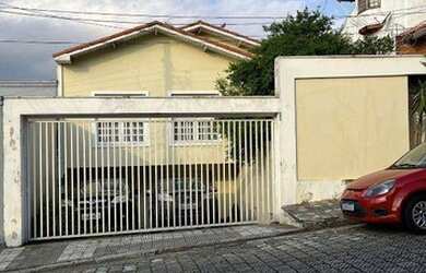 Imagem: A casa possui 3 Dormitórios, 4 Banheiros, 4 Vagas na garagem