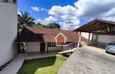 Imagem: A casa possui 3 Dormitórios, 4 Banheiros, 3 Vagas na garagem