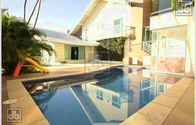 Imagem: A casa em condomínio à venda possui 5 Dormitórios, 4 Banheiros