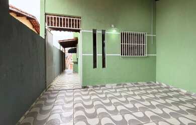 Imagem: A casa possui 2 Dormitórios, 1 Banheiro, 1 Vaga na garagem