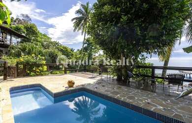 Imagem: A casa possui 5 Dormitórios, 5 Banheiros, 5 Vagas na garagem