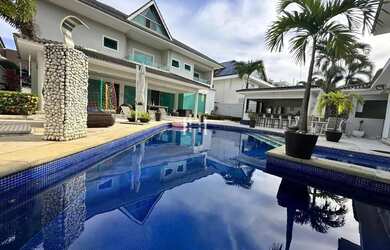 Imagem: A casa em condomínio possui 5 Dormitórios, 5 Banheiros, 4