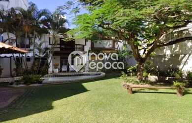 Imagem: A casa possui 5 Dormitórios, 5 Banheiros, 5 Vagas na garagem