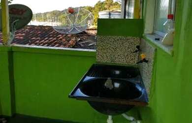 Imagem: A casa possui 3 Dormitórios e está localizado em São Tomé