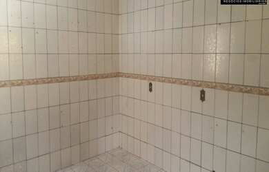 Imagem: A casa possui 3 Dormitórios, 2 Banheiros, 3 Vagas na garagem