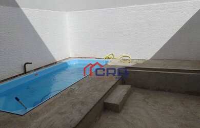 Imagem: A casa possui 3 Dormitórios, 2 Banheiros, 2 Vagas na garagem