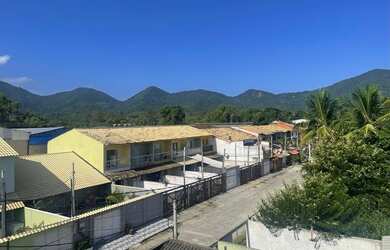 Imagem: A casa possui 2 Dormitórios, 3 Banheiros, 1 Vaga na garagem