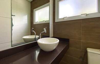 Imagem: A casa em condomínio possui 3 Dormitórios, 4 Banheiros, 3