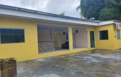 Imagem: A casa possui 4 Dormitórios, 5 Banheiros e 4 Vagas na garagem