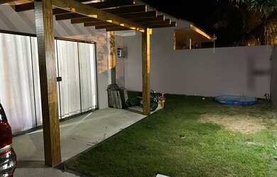 Imagem: A casa possui 3 Dormitórios, 3 Banheiros, 5 Vagas na garagem