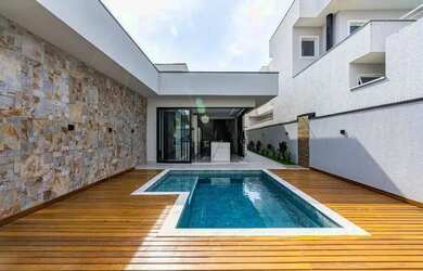 Imagem 2: Venda Casa com 262,60 metroQuadrado, 4 dormitório s , 3 vaga s . Swiss...