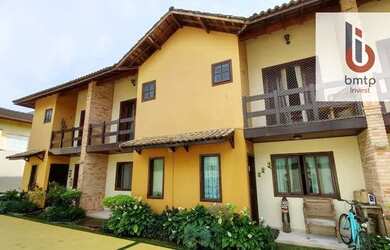 Imagem: A casa possui 2 Dormitórios, 1 Banheiro, 2 Vagas na garagem