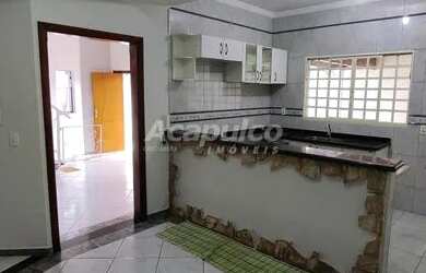 Imagem: A casa possui 3 Dormitórios, 2 Banheiros, 2 Vagas na garagem