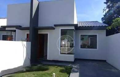 Imagem: A casa possui 2 Dormitórios, 2 Banheiros, 1 Vaga na garagem