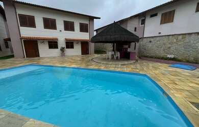 Imagem: A casa em condomínio possui 3 Dormitórios, 2 Banheiros, 2