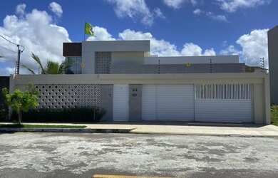 Imagem: A casa possui 3 Dormitórios, 4 Banheiros, 4 Vagas na garagem