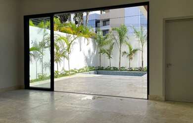 Imagem: A casa em condomínio possui 4 Dormitórios, 5 Banheiros, 4