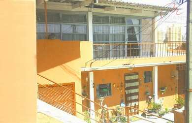 Imagem: A casa possui 4 Dormitórios, 4 Banheiros, 3 Vagas na garagem