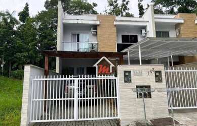 Imagem: A casa possui 2 Dormitórios, 2 Banheiros, 1 Vaga na garagem