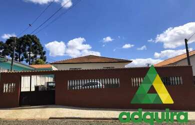 Imagem: A casa possui 3 Dormitórios, 1 Banheiro, 1 Vaga na garagem