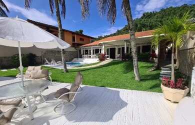 Imagem: A casa em condomínio possui 5 Dormitórios, 5 Banheiros, 5